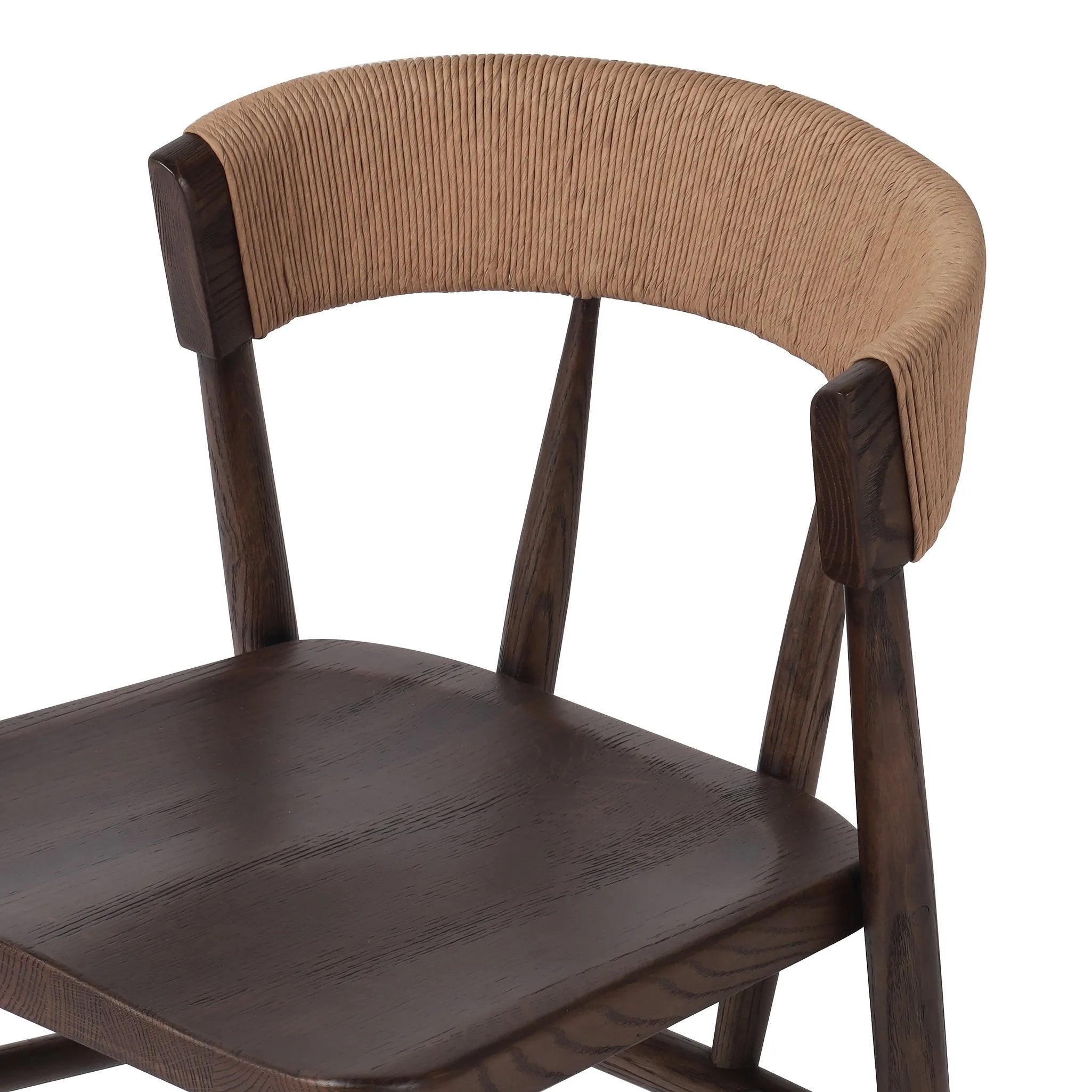 A solid oak dining chair defined by tapered legs and framing gives an updated look to the classic whistler chair. Finished with a paper rush wrapped detail on the back Amethyst Home provides interior design, new home construction design consulting, vintage area rugs, and lighting in the Des Moines metro area.