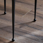 Slim, airy bases of black-finished iron support two varied-height nesting tables of smoked black glass. Designed to bunch or pull apart as desired, with ease Amethyst Home provides interior design, new home construction design consulting, vintage area rugs, and lighting in the Houston metro area.