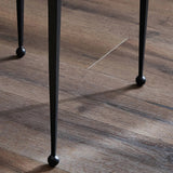 Slim, airy bases of black-finished iron support two varied-height nesting tables of smoked black glass. Designed to bunch or pull apart as desired, with ease Amethyst Home provides interior design, new home construction design consulting, vintage area rugs, and lighting in the Houston metro area.