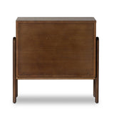 Made from brown-finished ash with leather-wrapped hardware, wide scale and sculptural details reflect the Brazilian midcentury inspiration behind this dual-drawer nightstand Amethyst Home provides interior design, new home construction design consulting, vintage area rugs, and lighting in the Laguna Beach metro area.