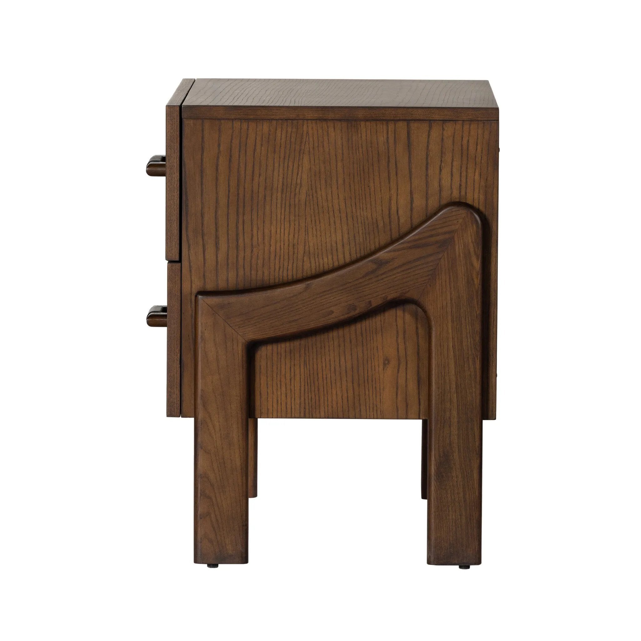 Made from brown-finished ash with leather-wrapped hardware, wide scale and sculptural details reflect the Brazilian midcentury inspiration behind this dual-drawer nightstand Amethyst Home provides interior design, new home construction design consulting, vintage area rugs, and lighting in the Monterey metro area.