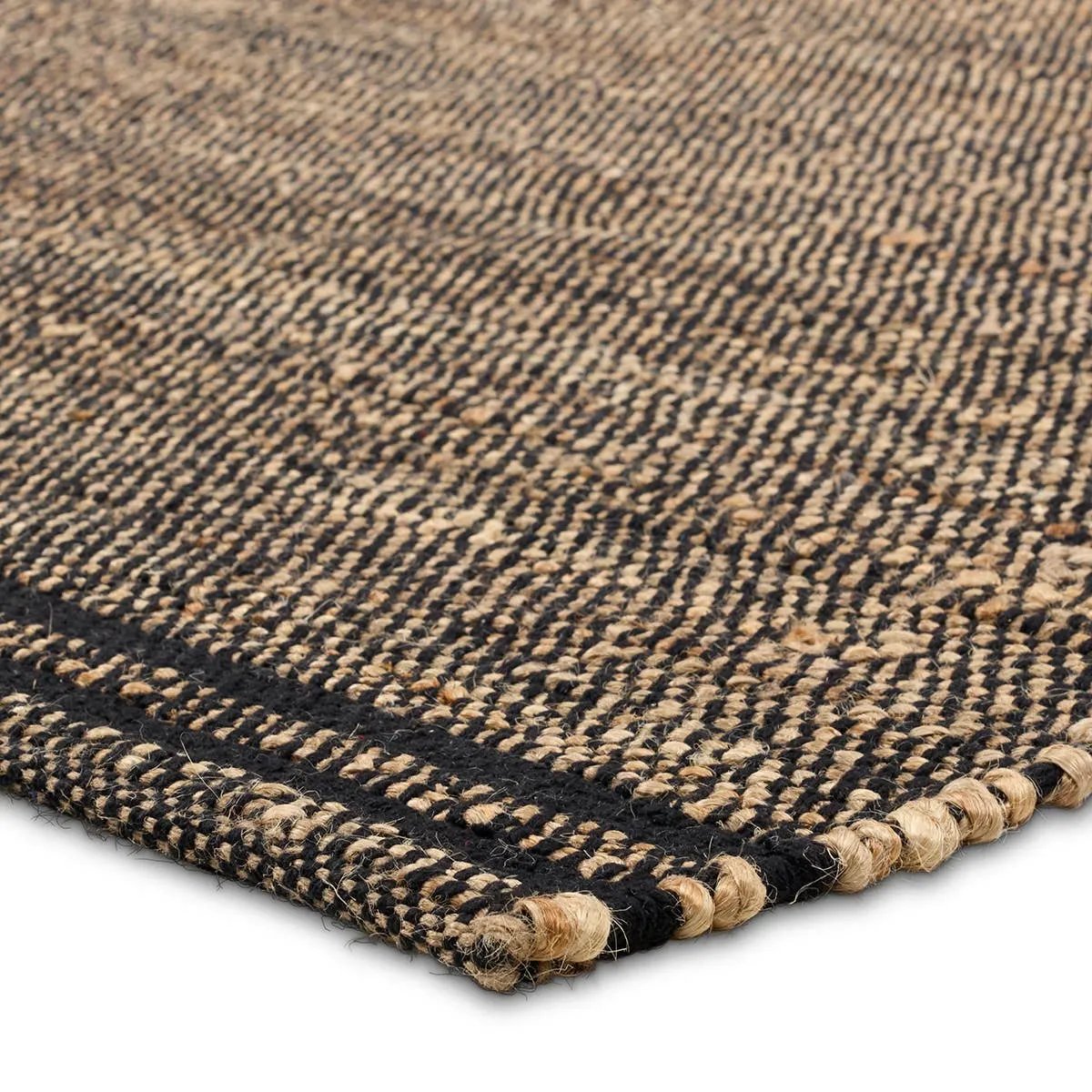 This natural fiber blend gives way to an organic look and feel to a space.  Hand loomed by artisans in India, the Ketra Solous demonstrates woven and braided techniques from the sustainable sources of jute and cotton that give way to incredibly rich texture.Handwove Amethyst Home provides interior design, new home construction design consulting, vintage area rugs, and lighting in the Miami metro area.