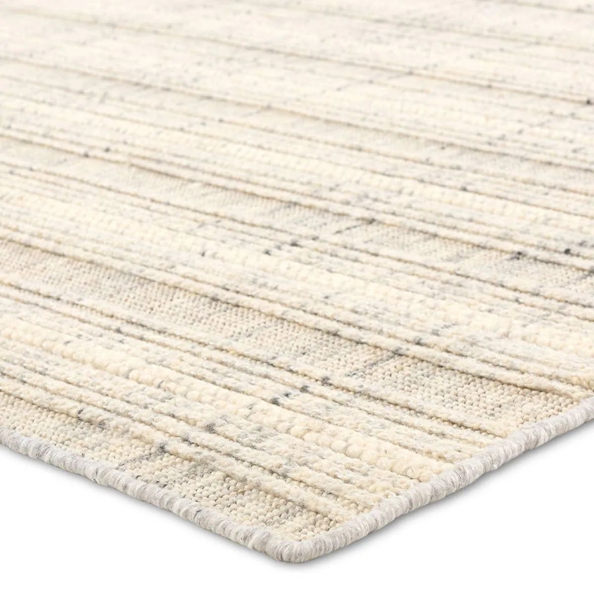 Handwoven in India, the Park City Promontory by Barclay Butera evokes a masculine modernity through neutral-toned grids. The modern Promontory rug showcases a grid in on-trend hues of cream and gray. The cut and looped pile adds texture while maintaining a soft hand. Amethyst Home provides interior design, new home construction design consulting, vintage area rugs, and lighting in the Dallas metro area.