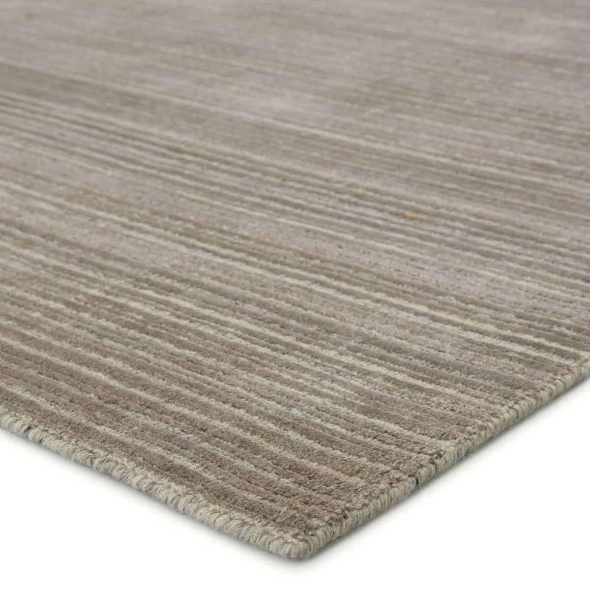 The easy-to-decorate, earthy tones of the Second Sunset Gradient prove that simplicity can sometimes be striking. The Gradient rug is hand loomed of durable wool and jasmine for a sumptuous and inviting hand. Amethyst Home provides interior design, new home construction design consulting, vintage area rugs, and lighting in the Charlotte metro area.