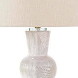With its alluring silhouette, the Hugo ceramic table lamp brings contemporary appeal and modern contrast to interiors. Employing a specialized glazing technique, master artisans hand-shape earthenware to produce a luxurious finish for subtle highs and lows that shift with the light source above. Amethyst Home provides interior design, new home construction design consulting, vintage area rugs, and lighting in the Washington metro area.