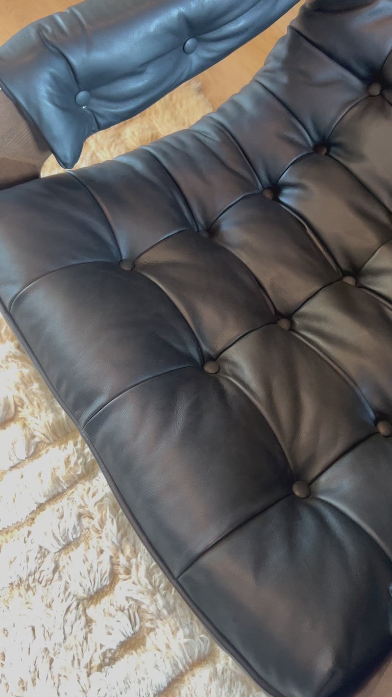 Featured in one of our recent home tours -- the Halston leather chair is the ultimate in comfort and surprised everyone who sat in it.  It has a hammock sling style construction that just feels sooo right. Amethyst Home provides interior design, new home construction design consulting, vintage area rugs, and lighting in the Miami metro area.