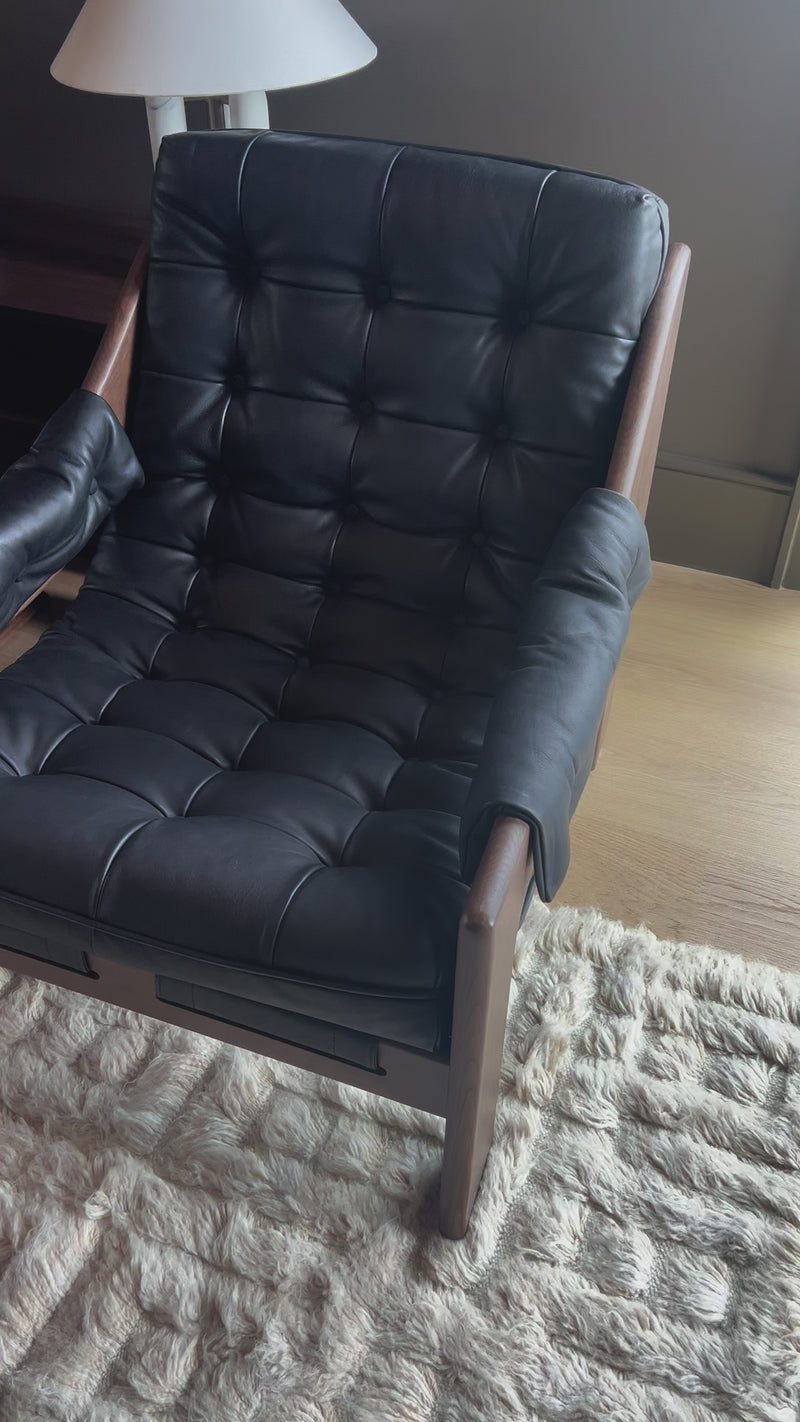 Featured in one of our recent home tours -- the Halston leather chair is the ultimate in comfort and surprised everyone who sat in it.  It has a hammock sling style construction that just feels sooo right. Amethyst Home provides interior design, new home construction design consulting, vintage area rugs, and lighting in the Monterey metro area.