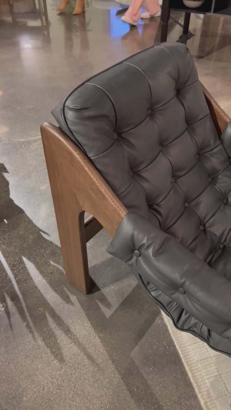 Featured in one of our recent home tours -- the Halston leather chair is the ultimate in comfort and surprised everyone who sat in it.  It has a hammock sling style construction that just feels sooo right. Amethyst Home provides interior design, new home construction design consulting, vintage area rugs, and lighting in the Newport Beach metro area.