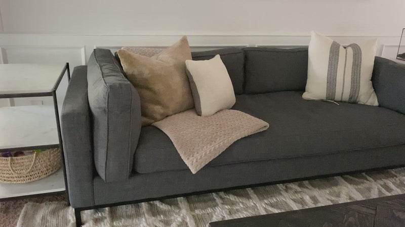 Streamlined yet comfortable!  We loved the subtle piping of the cushion details and stress-free color!  Flexible style, luxurious comfort and family-friendly upholstery. Clean, simple lines and black iron base keep everything casual and chic.  Overall Dimensions: 92.00"w x 38.00"d x 30.00"h Seat Depth: 28" Seat Height: 17" Arm Height from Floor: 24" Arm Height from Seat: 7"