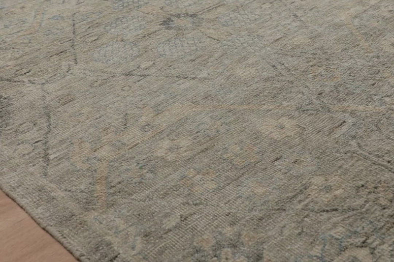 The Legacy Stone rug from Loloi is hand-knotted, refined, yet versatile for any home. The Legacy rug is deliberately distressed and sheared down to an extra low pile of 100% wool, creating a patina usually only imparted through decades of wear.  This rug features: - Beautiful vintage look and patina - Extra low pile - Easy to clean and maintain - Perfect for living and dining rooms, hallways, and extra large spaces  Hand-Knotted 100% Wool LZ-05 Stone 