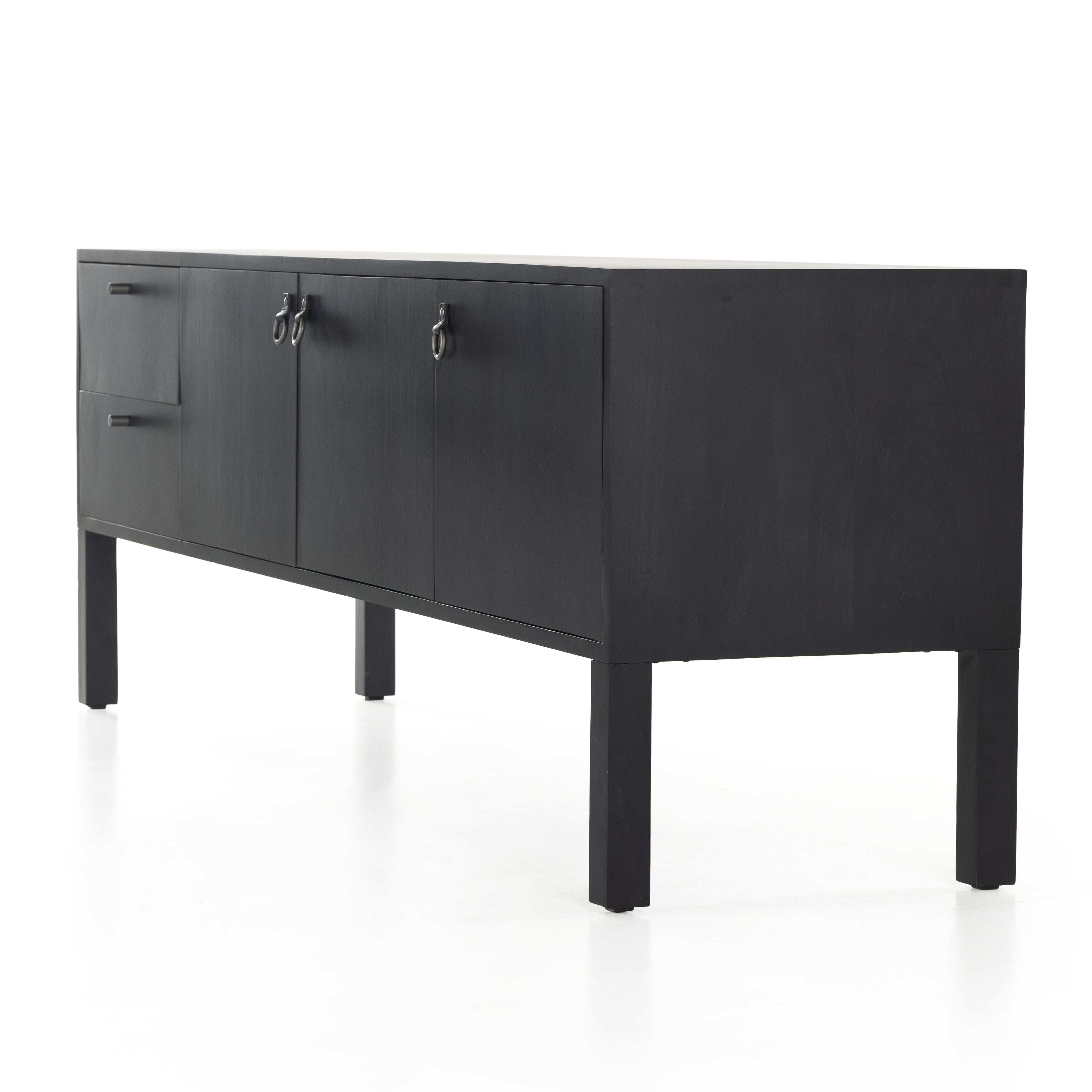 Beautifully simple in spirit. Black-washed dry poplar forms a clean-lined media console with faux dovetail joinery plus iron and leather hardware, for a material-driven update to Shaker-inspired styling. Rear cutouts for cord management. Amethyst Home provides interior design, new construction, custom furniture, and area rugs in the Dallas metro area.