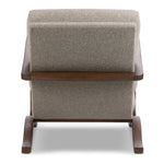 Inspired by vintage rocking chairs, the whimsical frame of this accent chair hugs removable plush feather foam-blend cushions on a webbed suspension style construction for true sink-in comfort. Cushions are upholstered in a new Turkish-made fabric made from 100% recycled olefin yarns with a tweed-like texture and feel Amethyst Home provides interior design, new home construction design consulting, vintage area rugs, and lighting in the San Diego metro area.