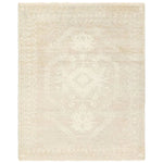 Hand carded wool, soft Tencel, and a neutral color palette define the handknotted Ashend Vavite. The Vavite rug showcases a Moroccan-inspired center medallion in a neutral cream and tan colorway. Geometric detailing establishes a thin border and provides a nod to the tribal styles of northern Africa. Amethyst Home provides interior design, new home construction design consulting, vintage area rugs, and lighting in the Des Moines metro area.