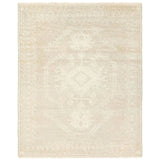 Hand carded wool, soft Tencel, and a neutral color palette define the handknotted Ashend Vavite. The Vavite rug showcases a Moroccan-inspired center medallion in a neutral cream and tan colorway. Geometric detailing establishes a thin border and provides a nod to the tribal styles of northern Africa. Amethyst Home provides interior design, new home construction design consulting, vintage area rugs, and lighting in the Des Moines metro area.