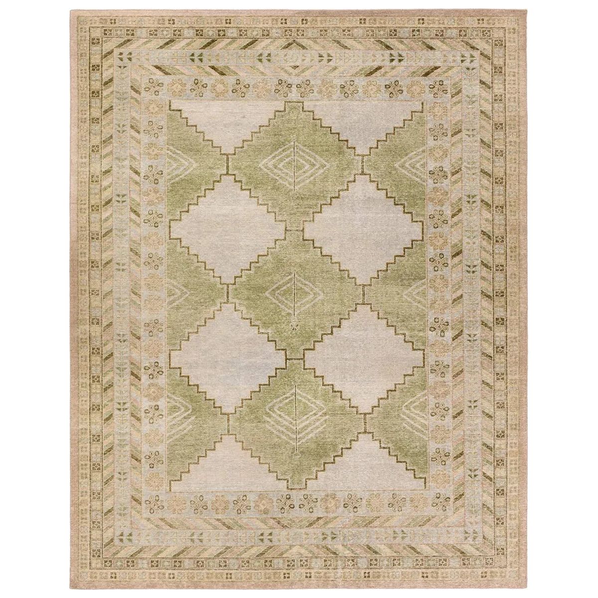 The updated traditional Gallant Enfield is an assortment of beautifully colored hand-knotted designs. The Enfield area rug showcases a vintage-inspired bordered medallion design in on-trend green, cream, light blue, and tan tones, stunningly distressed for texture and antiquity. Amethyst Home provides interior design, new home construction design consulting, vintage area rugs, and lighting in the Charlotte metro area.