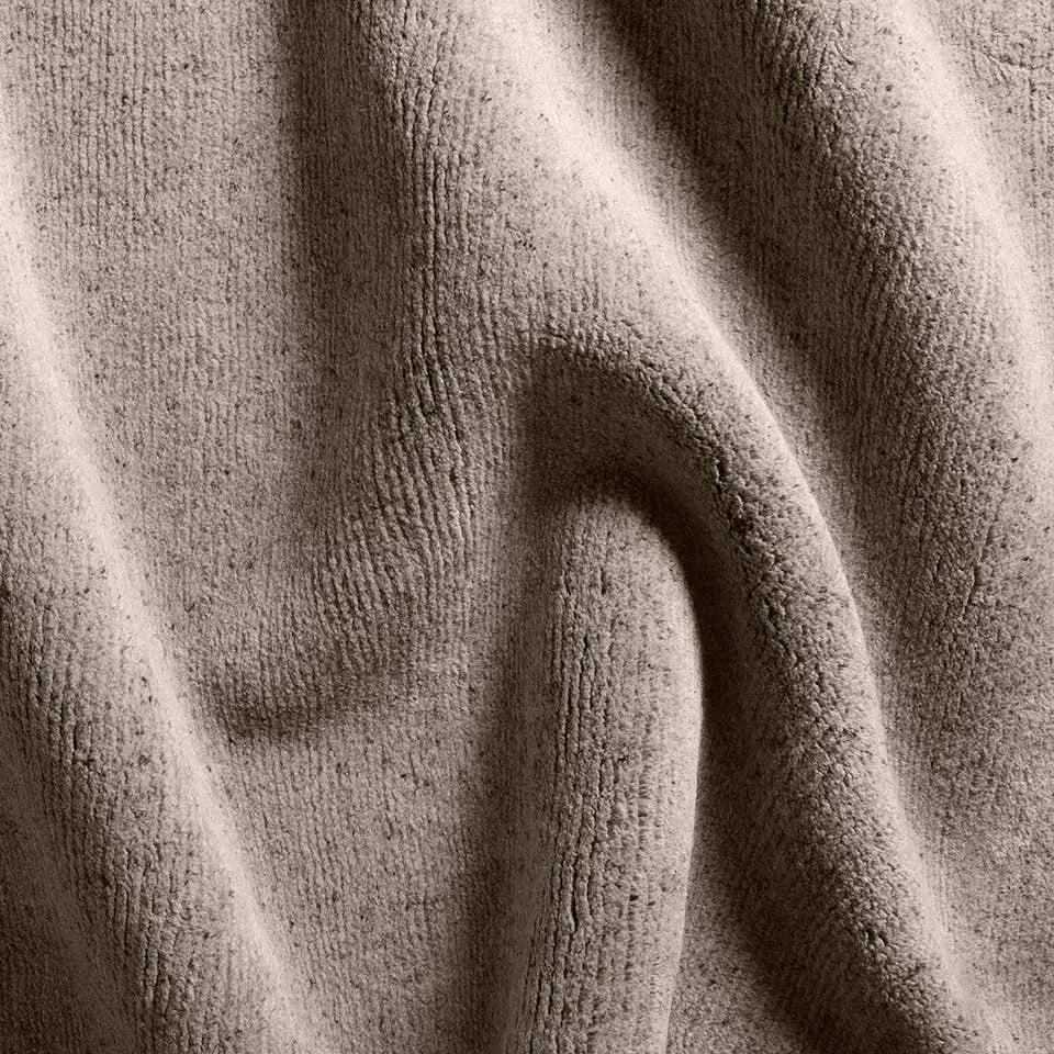 The Si Blanc Collection seamlessly blends the sumptuous fleece of Alpaca and the resilience of New Zealand Wool, creating a harmonious symphony of softness and durability. The Theia design is crafted with precision using gray Tibetan hand knots, embodying simplicity and soft sophistication that transforms any space.??Hand Knotte Amethyst Home provides interior design, new home construction design consulting, vintage area rugs, and lighting in the Kansas City metro area.